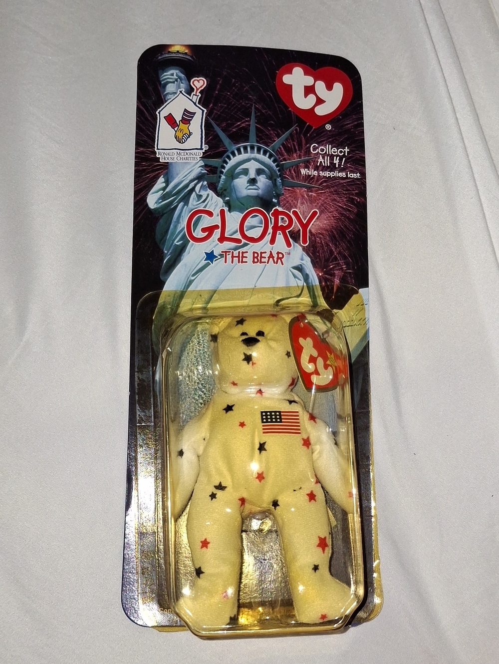 Ty Glory the Bear Plush with Red and Blue Stars.